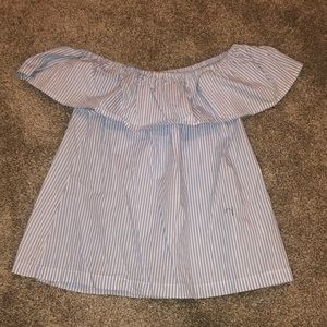 Off the shoulder, white & blue stripped shirt.
